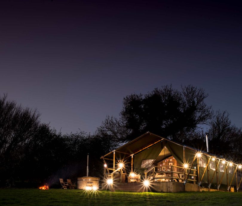 Blackberry Glamping safari tent in Exeter under night sky