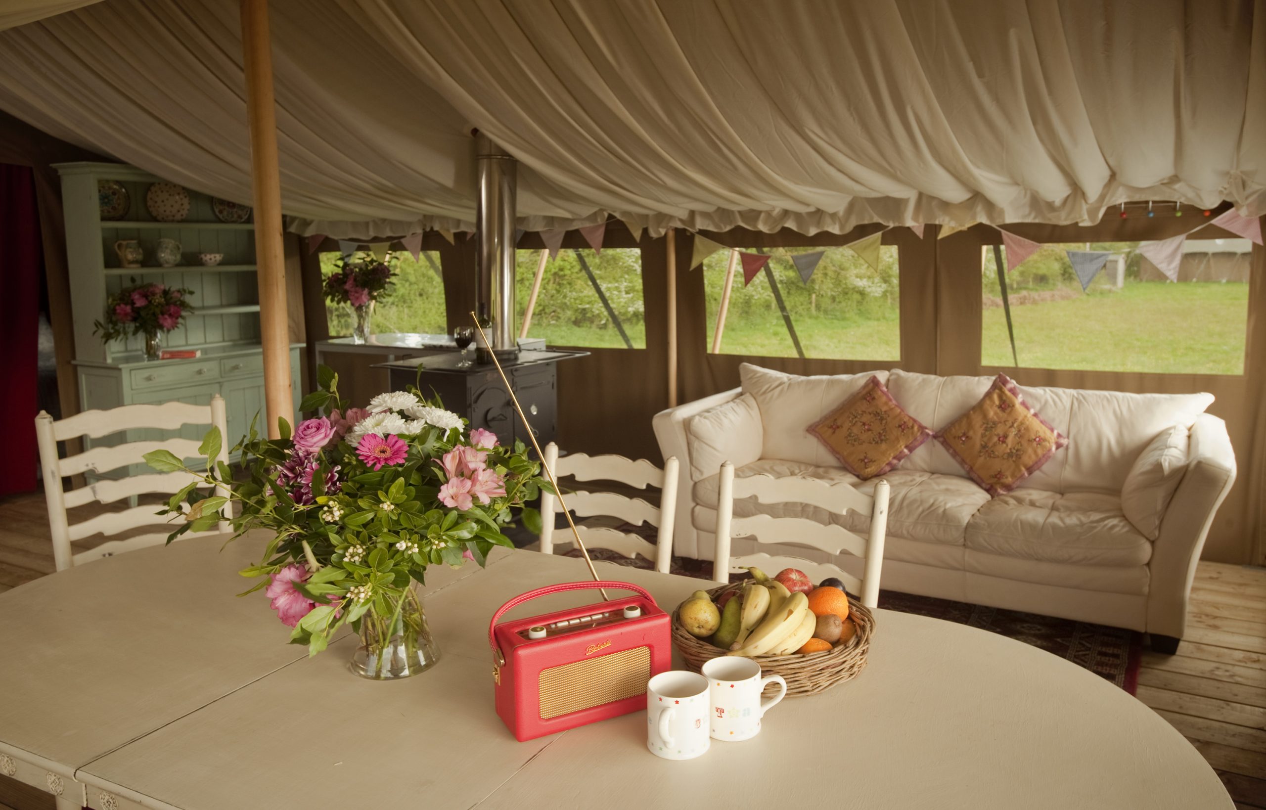 Dining Table inside a safari glamping tent at Cuckoo Down Farm Exeter