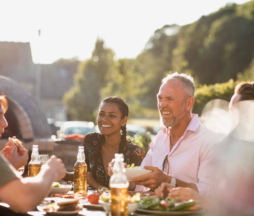 group drinking and eating inn a Devon Beer Garden